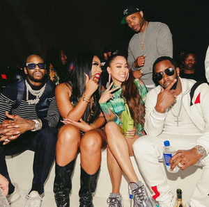 Lala wearing Gelareh Mizrahi Neon Yellow Top Handle Clutch with Megan the Stallion, Diddy and 2 Chainz